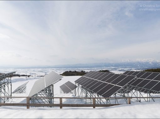 Solar panels in a wide winter landscape
